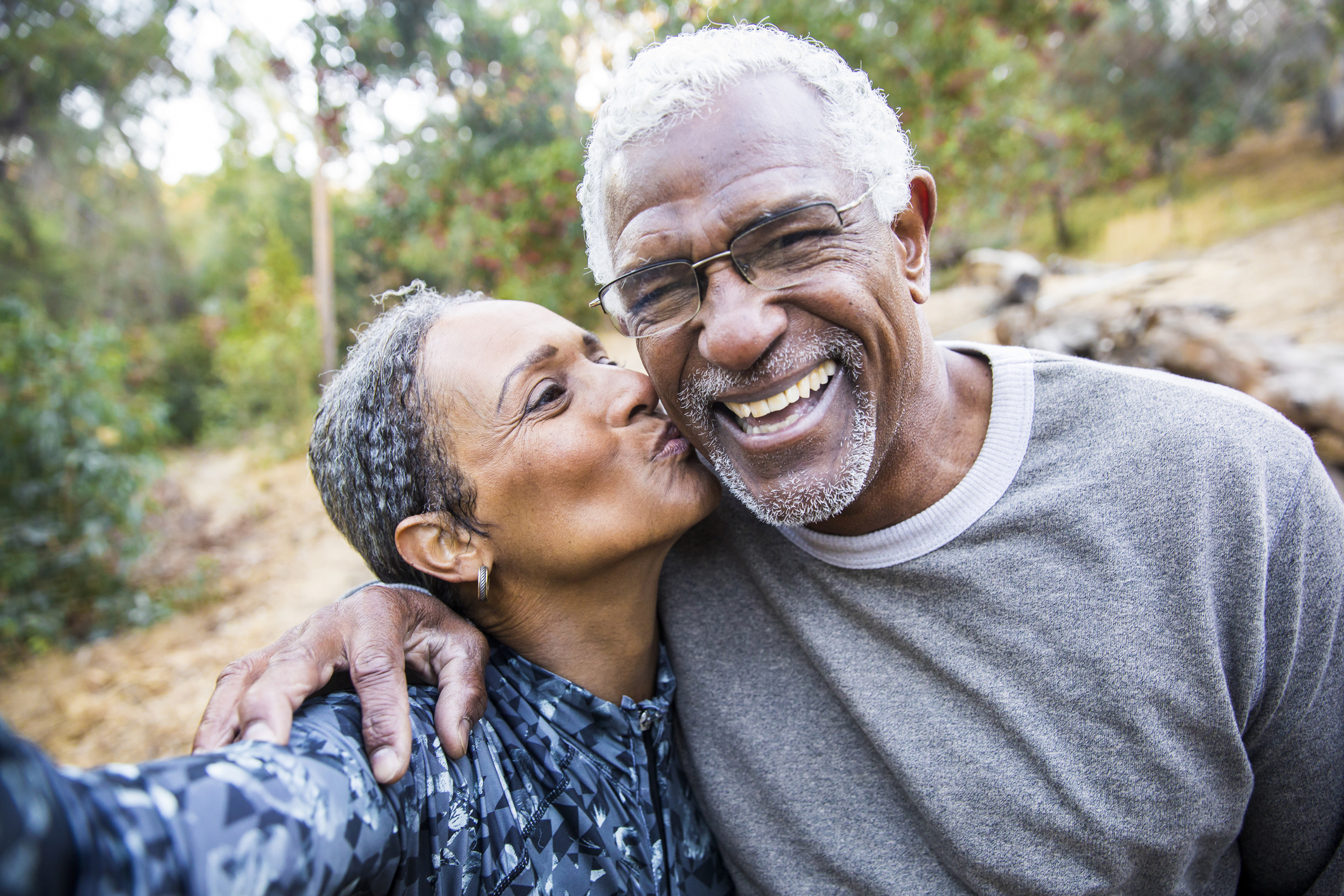 Retired couple kissing